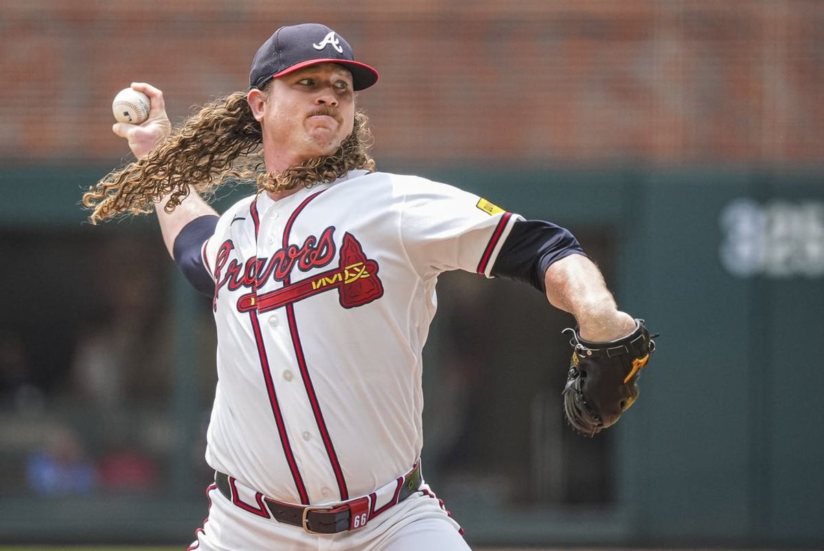 Jul 19, 2026; Cumberland, Georgia, USA; Atlanta Braves pitcher Grant Holmes (66) pitches against the Texas Rangers during the first inning at Truist Park. Mandatory Credit: Dale Zanine-Imagn Images