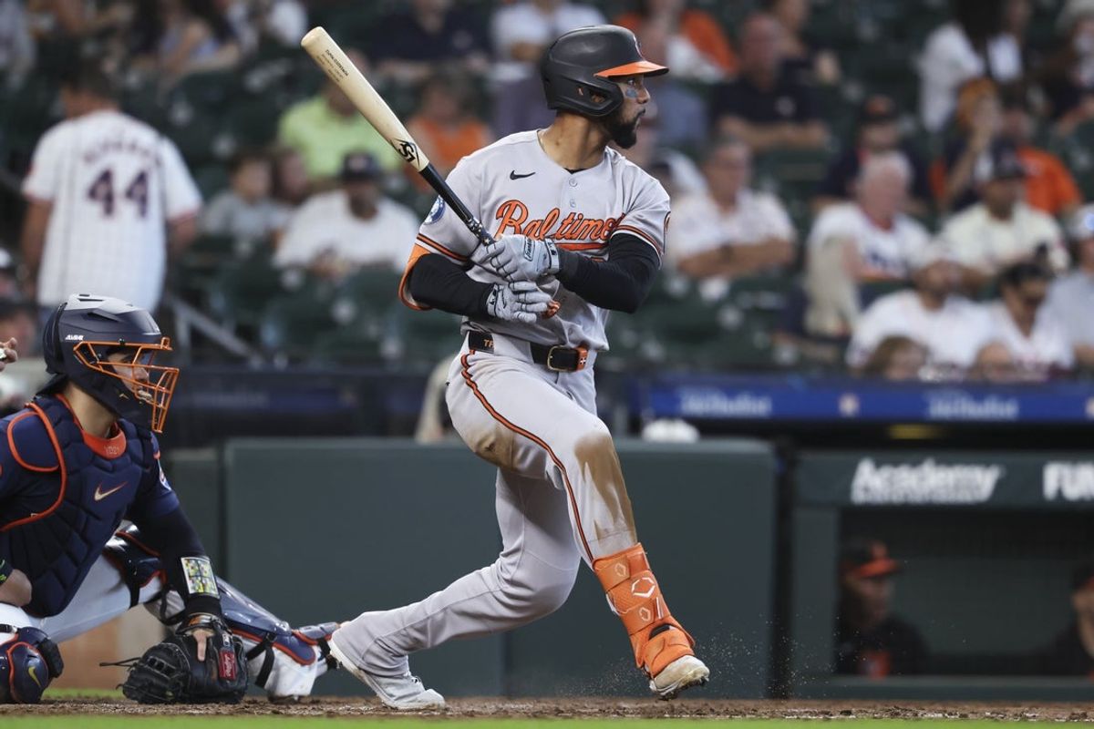 Jul 19, 2026; Houston, Texas, USA; Baltimore Orioles right fielder Leody Taveras (30) drives in two runs with an RBI single during the fifth inning against the Houston Astros at Daikin Park. Mandatory Credit: Troy Taormina-Imagn Images