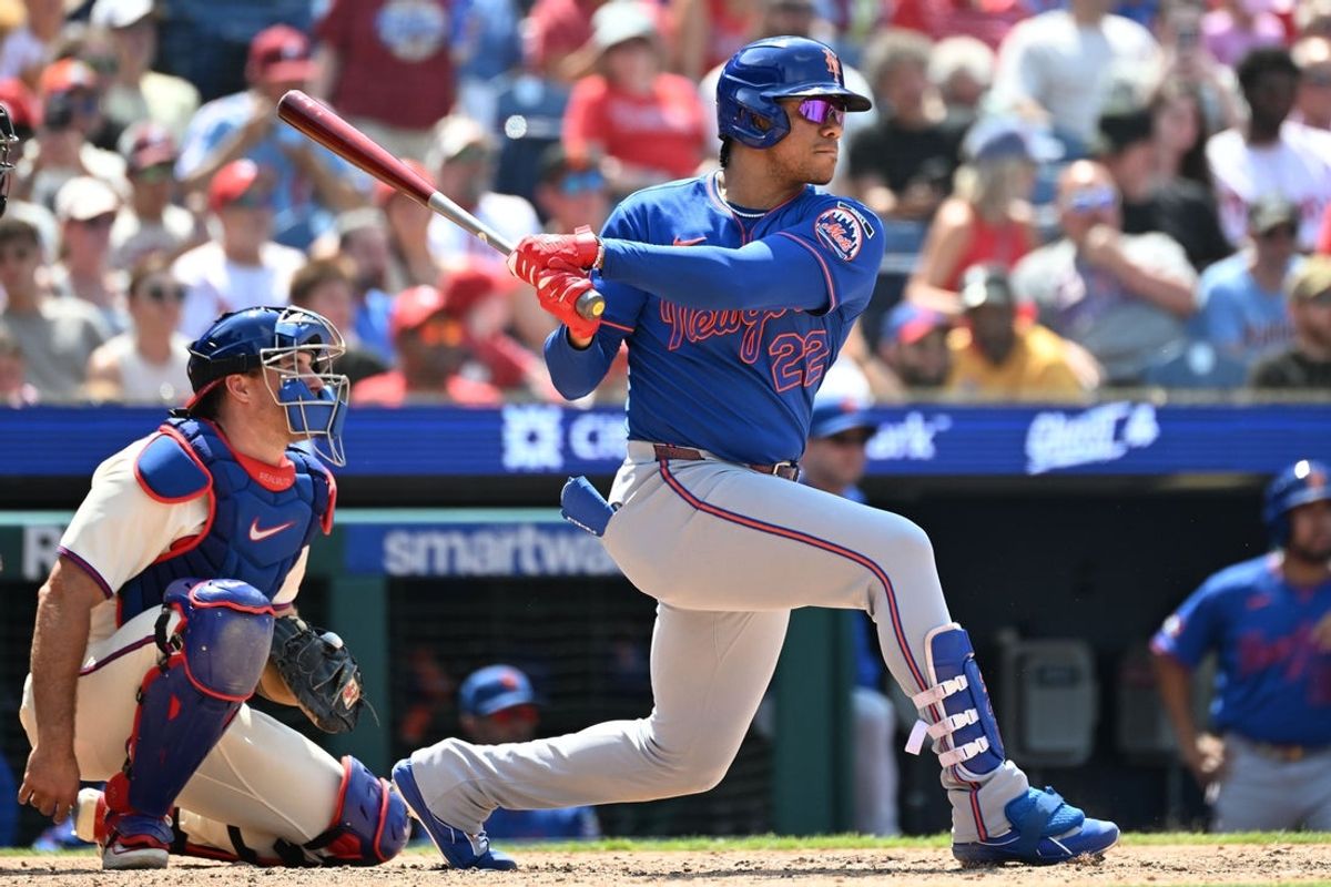 Jul 19, 2026; Philadelphia, Pennsylvania, USA; New York Mets left fielder Juan Soto (22) hits an RBI single during the sixth inning against the Philadelphia Phillies at Citizens Bank Park. Mandatory Credit: Eric Hartline-Imagn Images