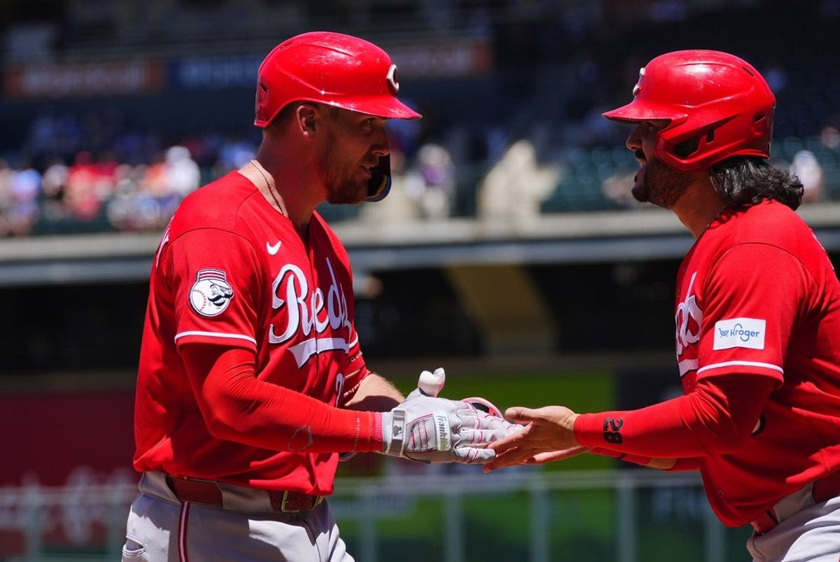 Jul 19, 2026; Denver, Colorado, USA; Cincinnati Reds catcher Tyler Stephenson (37) celebrates his two run home run with third baseman Eugenio Suarez (28) in the first inning against the Colorado Rockies at Coors Field. Mandatory Credit: Ron Chenoy-Imagn Images