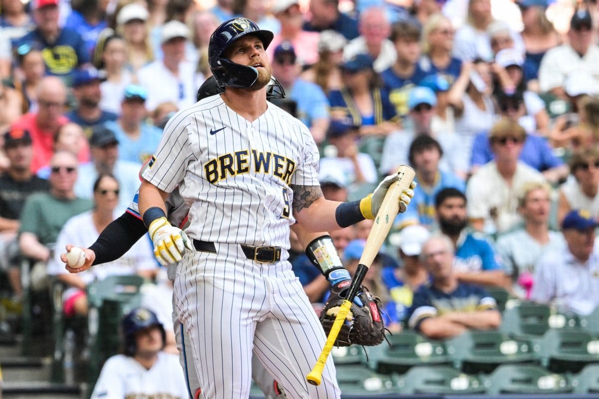 Jul 19, 2026; Milwaukee, Wisconsin, USA;  Milwaukee Brewers first baseman Jake Bauers (9) reacts after striking out in the fourth inning against the Miami Marlins at American Family Field. Mandatory Credit: Benny Sieu-Imagn Images