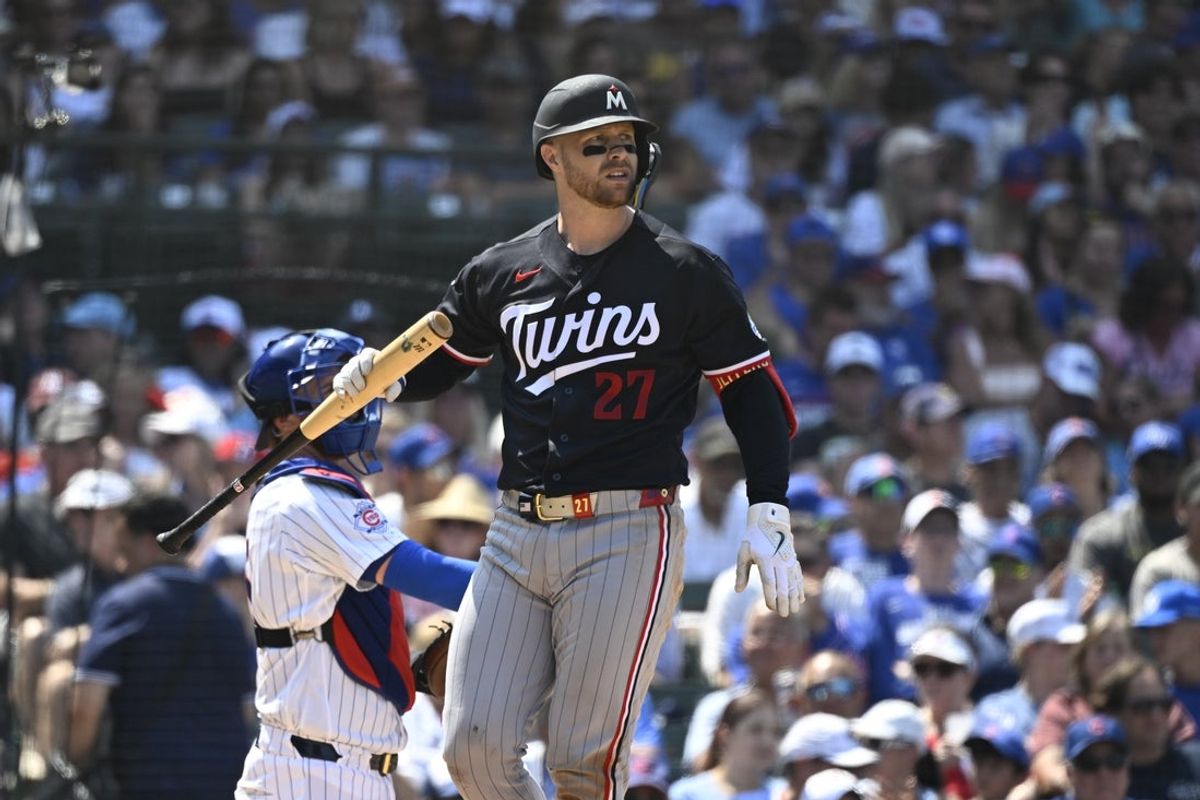 Jul 19, 2026; Chicago, Illinois, USA;  Minnesota Twins catcher Ryan Jeffers (27) strikers out during the sixth inning against the Chicago Cubs at Wrigley Field. Mandatory Credit: Matt Marton-Imagn Images