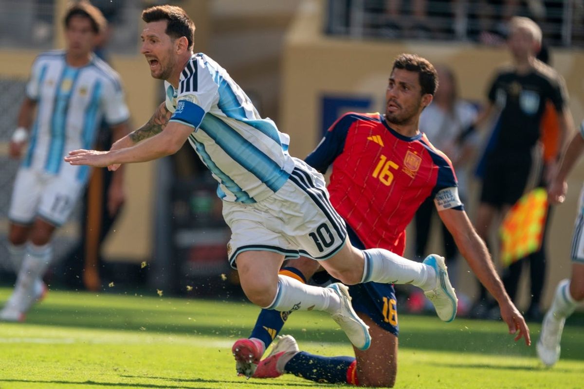 Argentina forward Lionel Messi (10) is trapped by Spain midfielder Rodri (16)  during the FIFA World Cup 2026 final between Argentina and Spain at New York New Jersey Stadium on Sunday, July 19, 2026, in East Rutherford, NJ.