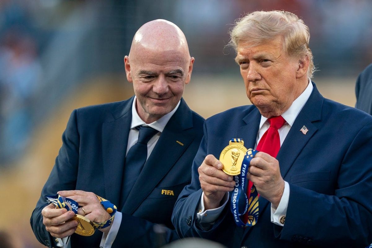President Donald Trump and FIFA President Gianni Infantino hold World Cup medals during the FIFA World Cup 2026 final between Argentina and Spain at New York New Jersey Stadium on Sunday, July 19, 2026, in East Rutherford, NJ.