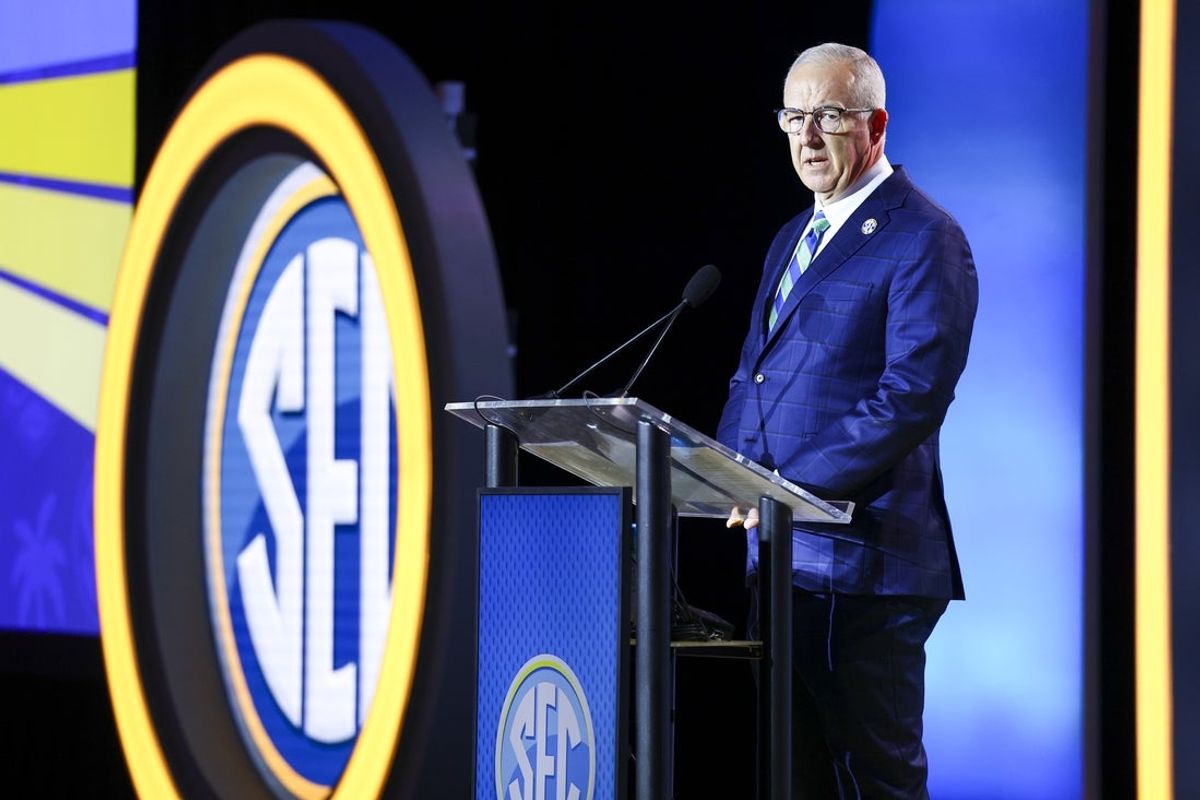 Jul 20, 2026; Tampa, FL, USA; SEC Commissioner Greg Sankey speaks to the press during SEC Football Kickoff Media Day at the Tampa Marriott. Mandatory Credit: Nathan Ray Seebeck-Imagn Images