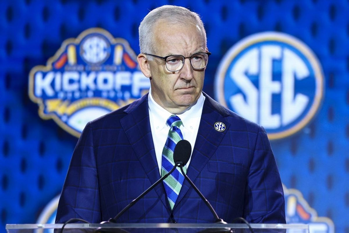 Jul 20, 2026; Tampa, FL, USA; SEC Commissioner Greg Sankey speaks to the press during SEC Football Kickoff Media Day at the Tampa Marriott. Mandatory Credit: Nathan Ray Seebeck-Imagn Images