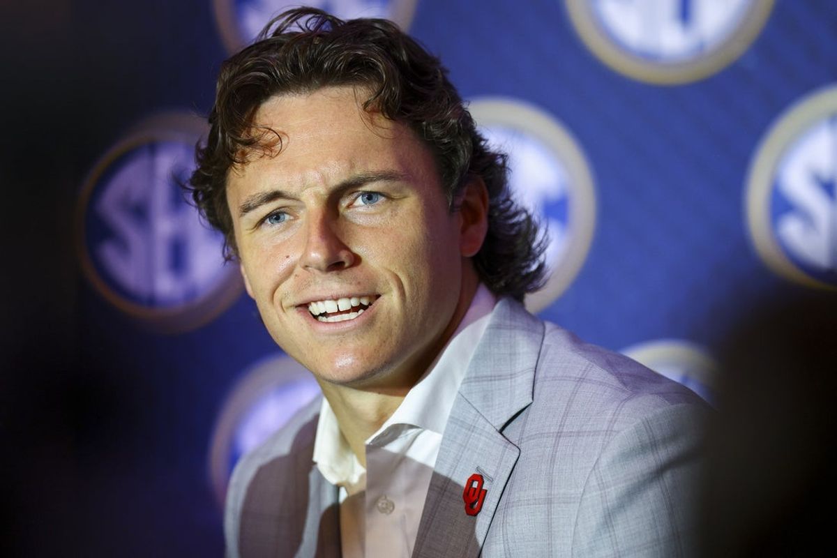 Jul 20, 2026; Tampa, FL, USA; Oklahoma Sooners quarterback John Mateer (10) speaks to the press during SEC Football Kickoff Media Day at the Tampa Marriott. Mandatory Credit: Nathan Ray Seebeck-Imagn Images