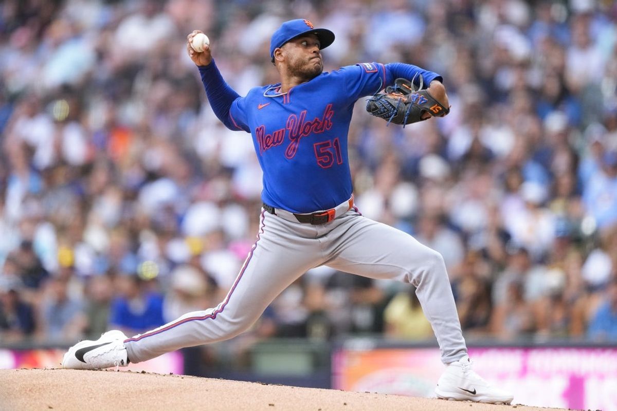 Jul 20, 2026; Milwaukee, Wisconsin, USA;  New York Mets pitcher Freddy Peralta (51) throws a pitch during the first inning against the Milwaukee Brewers at American Family Field. Mandatory Credit: Jeff Hanisch-Imagn Images