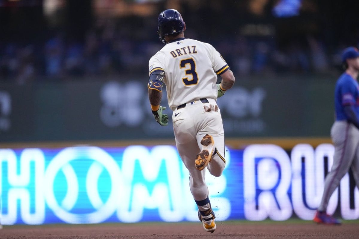 Jul 20, 2026; Milwaukee, Wisconsin, USA;  Milwaukee Brewers third baseman Joey Ortiz (3) rounds the bases after hitting a home run during the sixth inning against the New York Mets at American Family Field. Mandatory Credit: Jeff Hanisch-Imagn Images