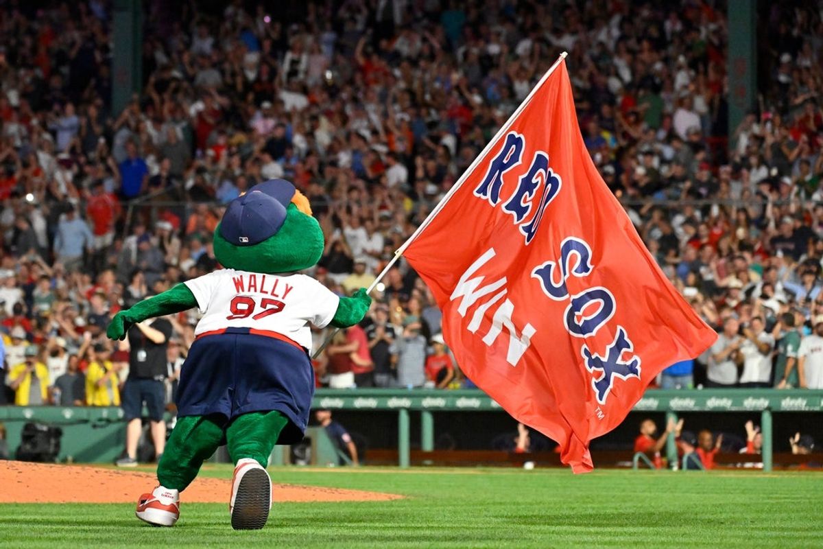 Jul 20, 2026; Boston, Massachusetts, USA; Boston Red Sox mascot Wally celebrates the team's victory over the Baltimore Orioles with fans at Fenway Park. Mandatory Credit: Eric Canha-Imagn Images