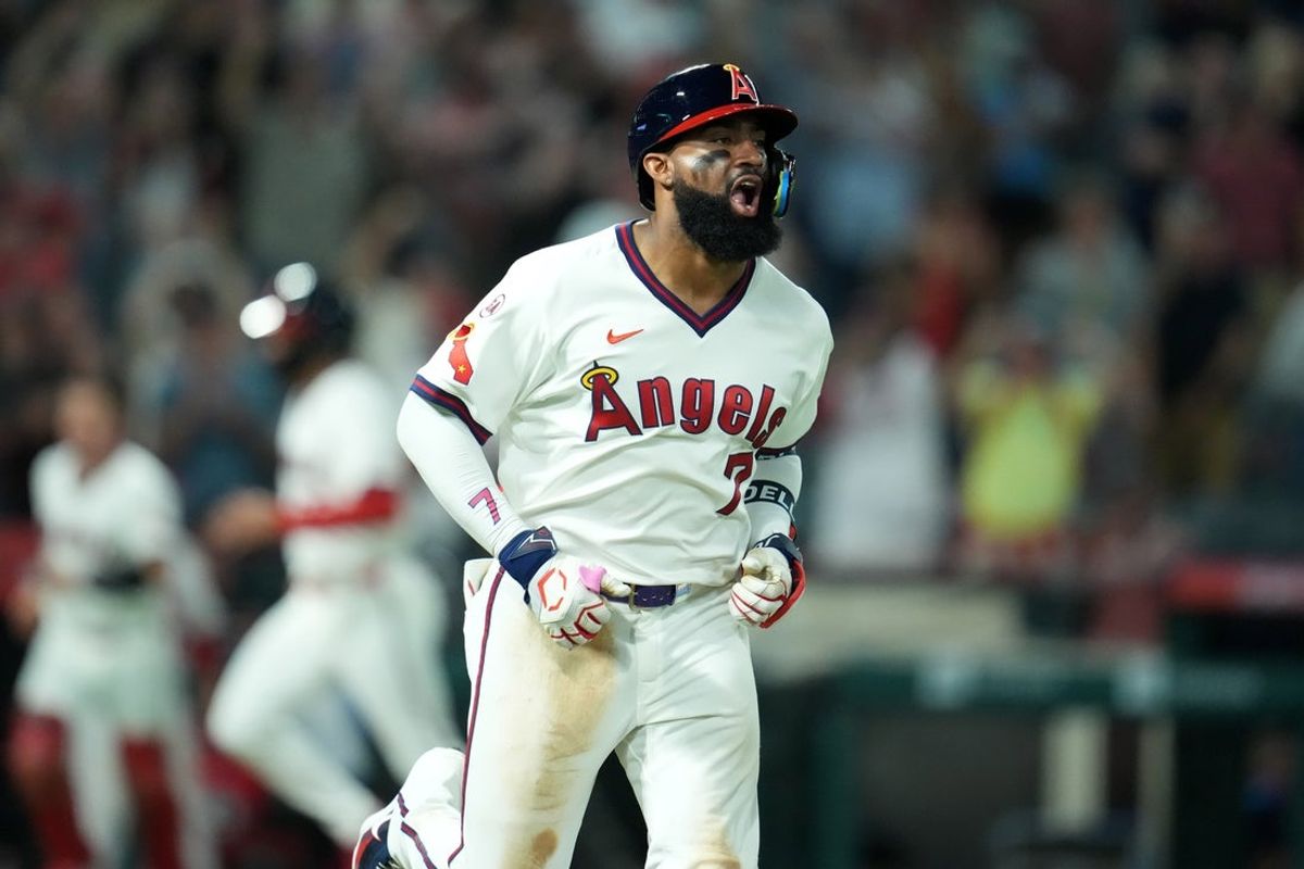 Jul 20, 2026; Anaheim, California, USA; Los Angeles Angels right fielder Jo Adell (7) reacts after a walk-off hit by pitch against the St. Louis Cardinals at Angel Stadium. Mandatory Credit: Kirby Lee-Imagn Images