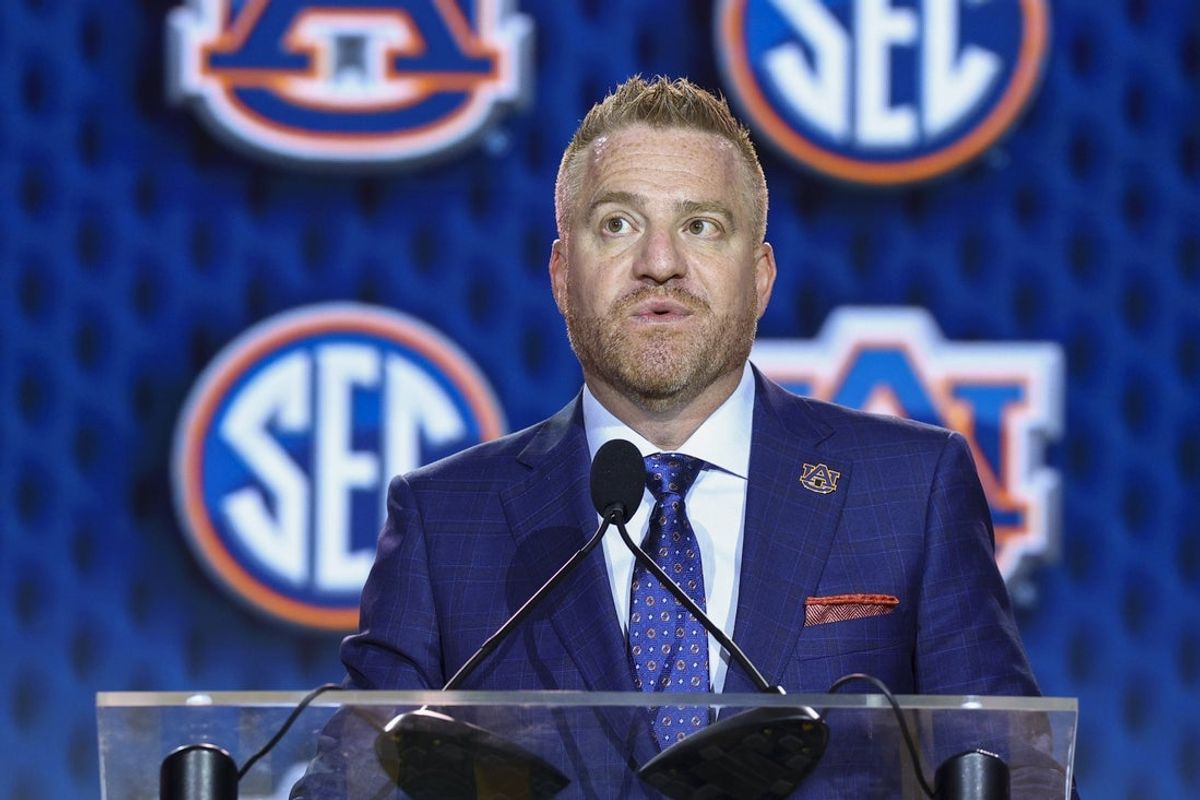 Jul 21, 2026; Tampa, FL, USA; Auburn Tigers head coach Alex Golesh speaks to the press during SEC Football Kickoff Media Day at the Tampa Marriott. Mandatory Credit: Nathan Ray Seebeck-Imagn Images