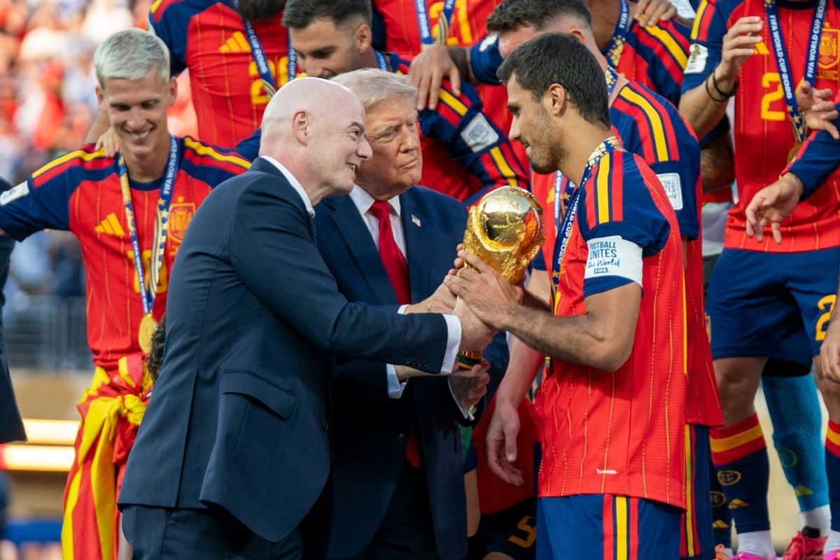 President Donald Trump and FIFA President Gianni Infantino present the World Cup Trophy to Spain during the FIFA World Cup 2026 final between Argentina and Spain at New York New Jersey Stadium on Sunday, July 19, 2026, in East Rutherford, NJ.