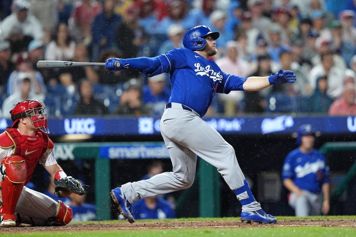 Jul 21, 2026; Philadelphia, Pennsylvania, USA; Los Angeles Dodgers infielder Max Muncy (13) hits a two-run home run against the Philadelphia Phillies in the fourth inning at Citizens Bank Park. Mandatory Credit: Kyle Ross-Imagn Images