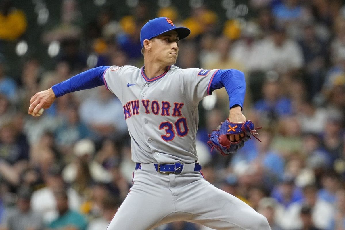 Jul 21, 2026; Milwaukee, Wisconsin, USA; New York Mets relief pitcher Luke Weaver (30) delivers a pitch against the Milwaukee Brewers in the seventh inning at American Family Field. Mandatory Credit: Michael McLoone-Imagn Images