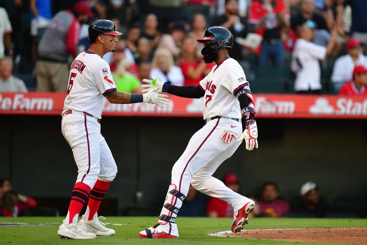 Jul 21, 2026; Anaheim, California, USA; Los Angeles Angels right fielder Jo Adell (7) is greeted by third baseman Vaughn Grissom (5) after hitting a two run home run against the St. Louis Cardinals during the first inning at Angel Stadium. Mandatory Credit: Gary A. Vasquez-Imagn Images