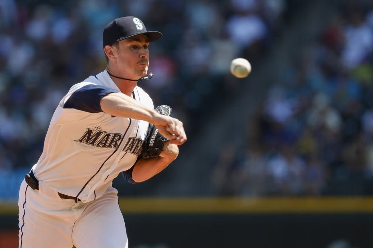 Jul 22, 2026; Seattle, Washington, USA; Seattle Mariners starting pitcher Emerson Hancock (26) throws against the Cincinnati Reds during the first inning at T-Mobile Park. Mandatory Credit: Joe Nicholson-Imagn Images