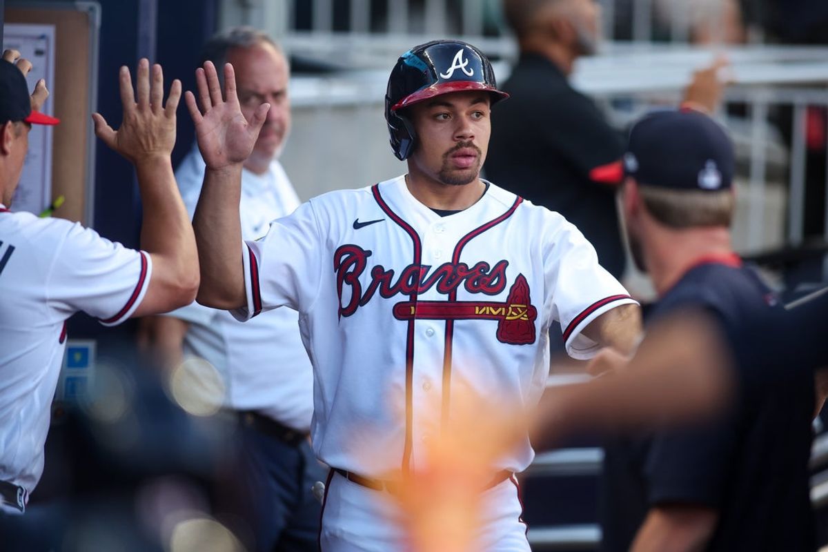 Jul 22, 2026; Atlanta, Georgia, USA; Atlanta Braves catcher Drake Baldwin (30) celebrates with teammates after scoring a run against the San Diego Padres in the first inning at Truist Park. Mandatory Credit: Brett Davis-Imagn Images