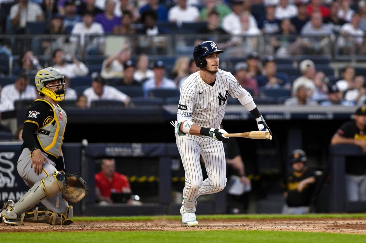 Jul 22, 2026; Bronx, New York, USA; New York Yankees left fielder Cody Bellinger (35) hits a double against the Pittsburgh Pirates during the fourth inning at Yankee Stadium. Mandatory Credit: John Jones-Imagn Images
