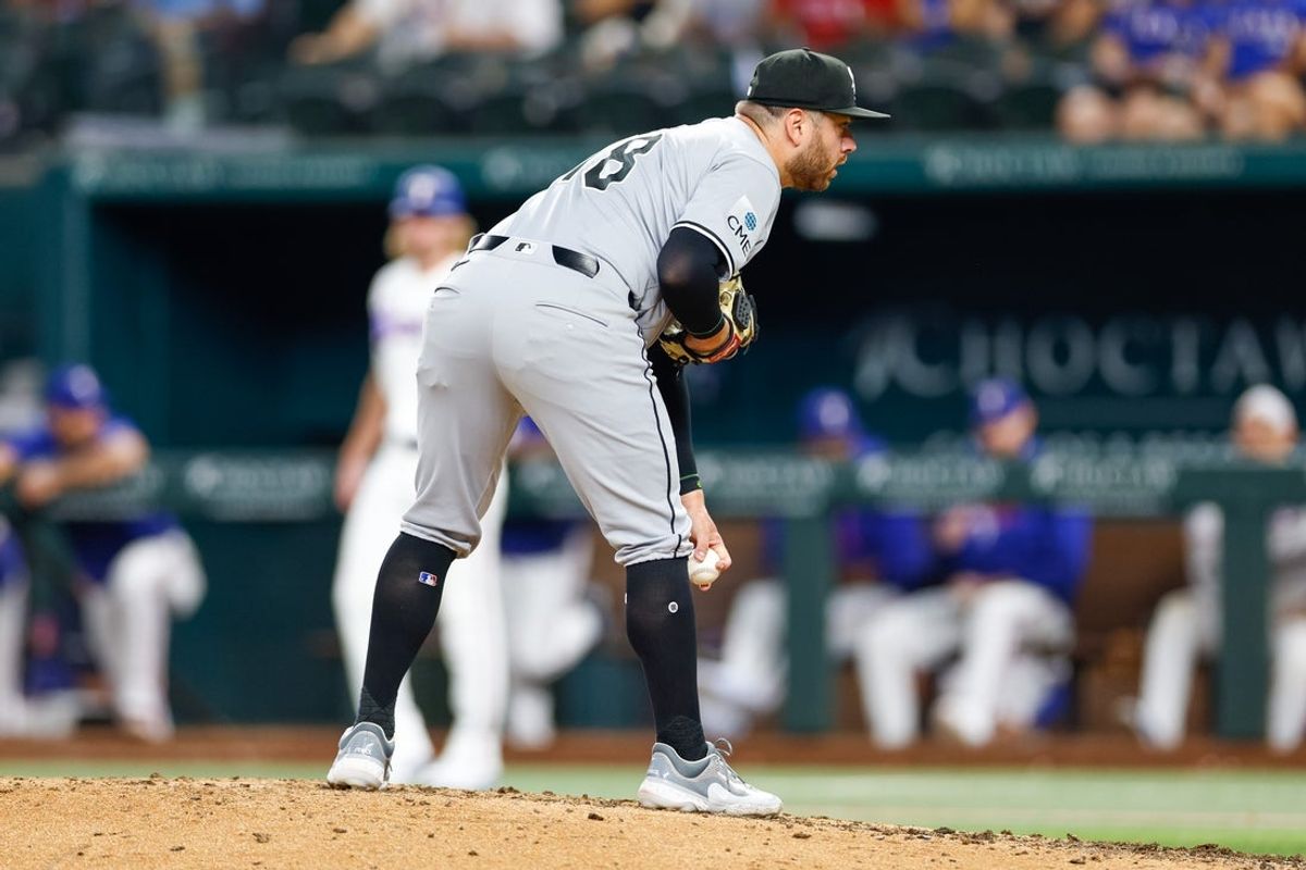 Jul 22, 2026; Arlington, Texas, USA; Chicago White Sox pitcher Anthony Kay (18) peers in for the sign during the fifth inning against the Texas Rangers at Globe Life Field. Mandatory Credit: Andrew Dieb-Imagn Images