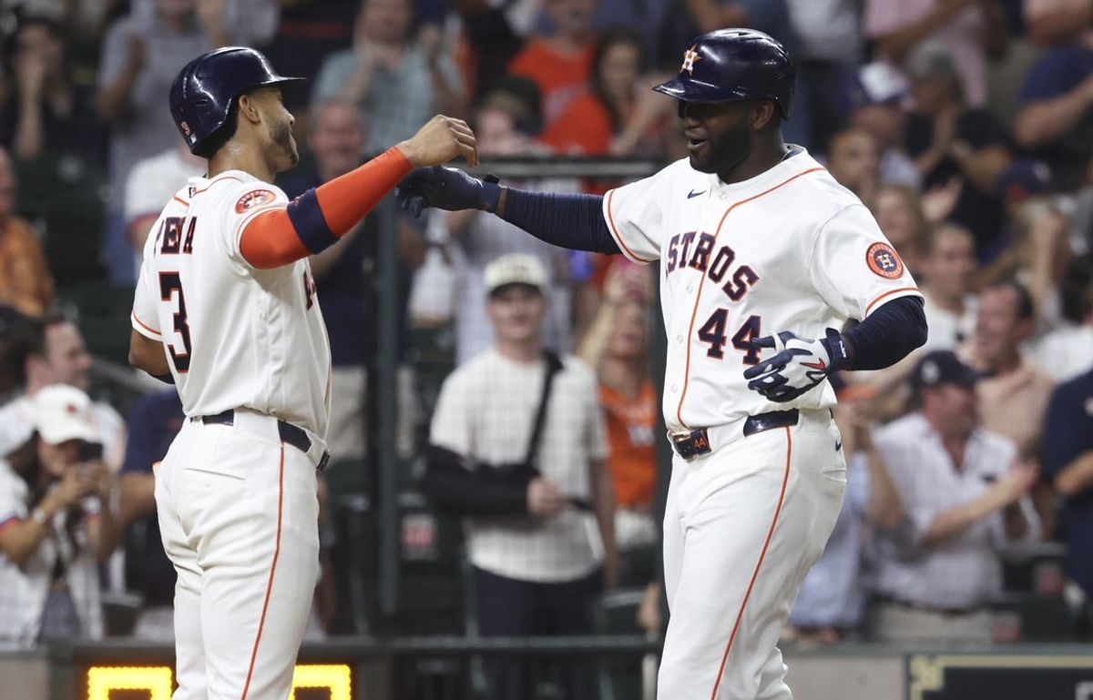 Jul 22, 2026; Houston, Texas, USA; Houston Astros left fielder Yordan Alvarez (44) celebrates with shortstop Jeremy Pena (3) after hitting a home run during the eighth inning against the Miami Marlins at Daikin Park. Mandatory Credit: Troy Taormina-Imagn Images