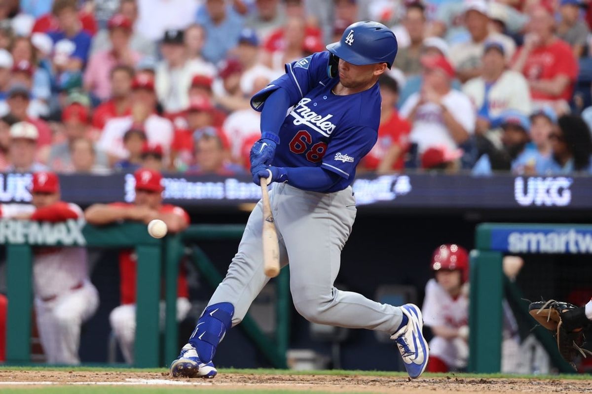 Jul 22, 2026; Philadelphia, Pennsylvania, USA; Los Angeles Dodgers catcher Dalton Rushing (68) hits a two RBI double against the Philadelphia Phillies during the fifth inning at Citizens Bank Park. Mandatory Credit: Bill Streicher-Imagn Images