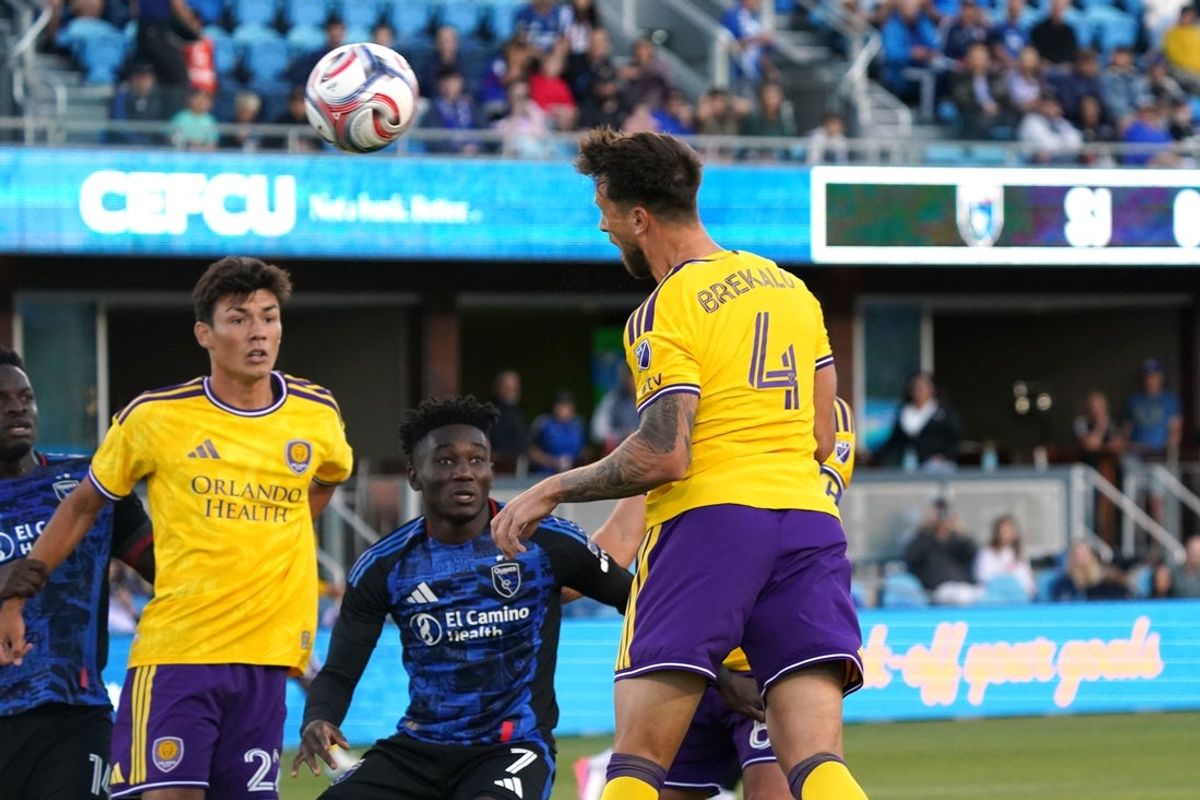 Jul 22, 2026; San Jose, California, USA;  Orlando City SC defender David Brekalo (4) scores a goal while defended by San Jose Earthquakes forward Ousseni Bouda (7) in the first half at PayPal Park. Mandatory Credit: David Gonzales-Imagn Images