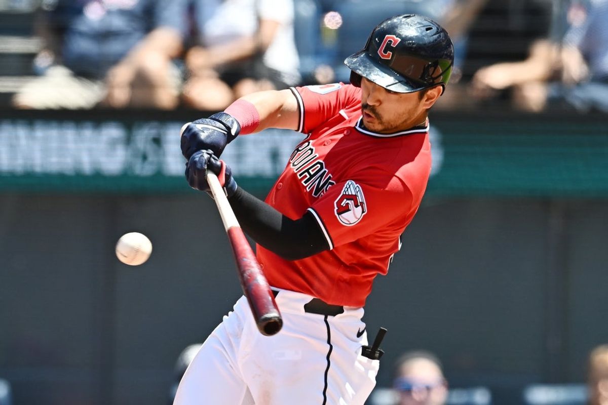 Jul 23, 2026; Cleveland, Ohio, USA; Cleveland Guardians left fielder Steven Kwan (38) hits a single during the third inning against the Minnesota Twins at Progressive Field. Mandatory Credit: Ken Blaze-Imagn Images