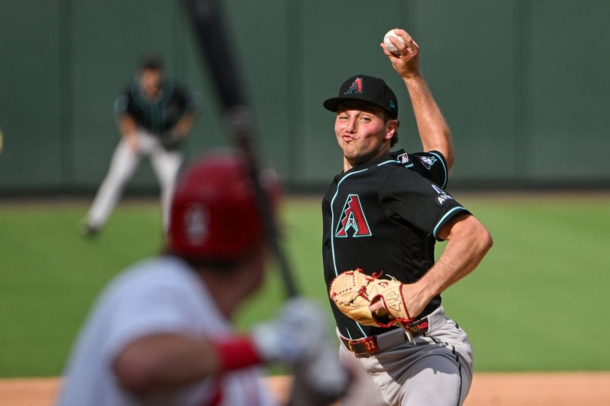 Jul 23, 2026; St. Louis, Missouri, USA; Arizona Diamondbacks starting pitcher Brandon Pfaadt (32) throws against St. Louis Cardinals first baseman Blaze Jordan (33) during the fourth inning at Busch Stadium. Mandatory Credit: Jeff Curry-Imagn Images