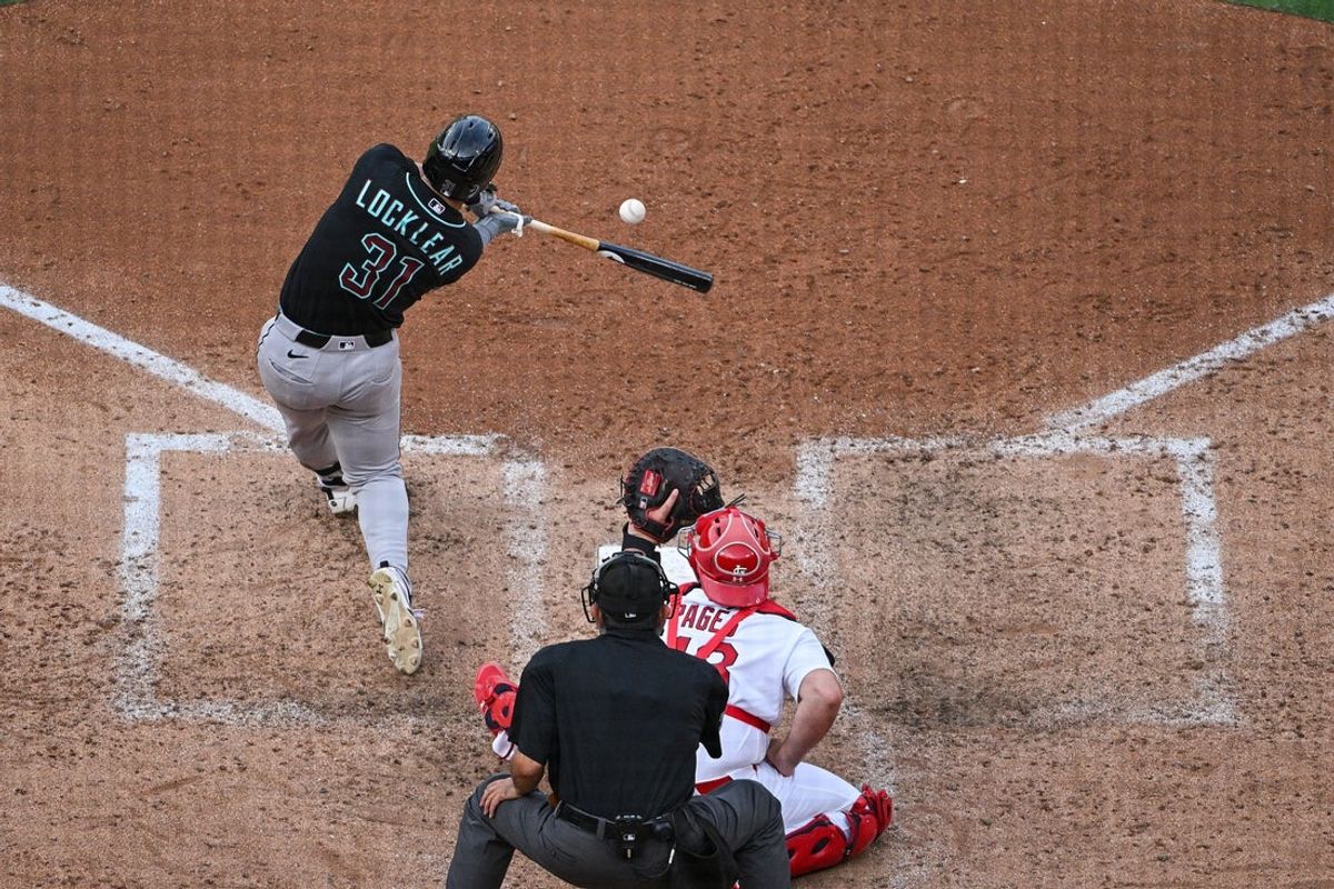 Jul 23, 2026; St. Louis, Missouri, USA; Arizona Diamondbacks first baseman Tyler Locklear (31) hits a one run single against the St. Louis Cardinals during the eighth inning at Busch Stadium. Mandatory Credit: Jeff Curry-Imagn Images