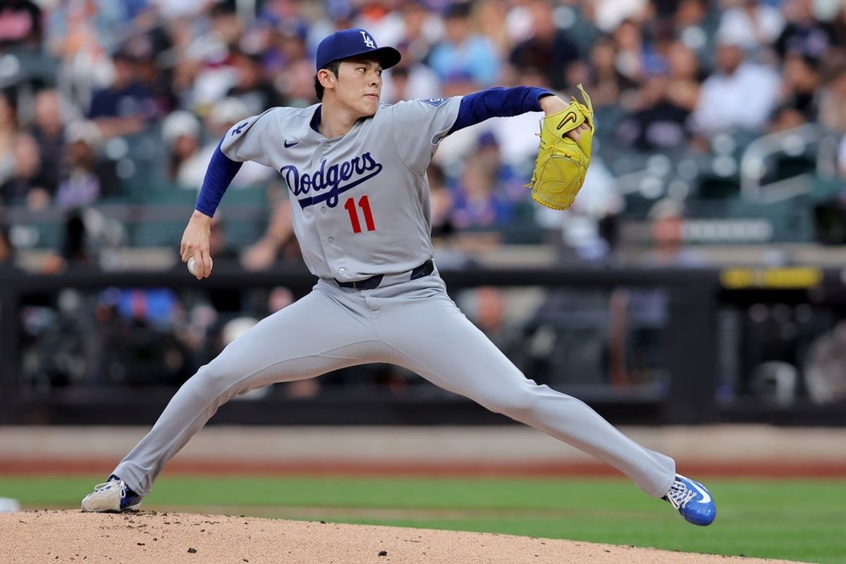 Jul 24, 2026; New York City, New York, USA; Los Angeles Dodgers starting pitcher Roki Sasaki (11) pitches against the New York Mets during the first inning at Citi Field. Mandatory Credit: Brad Penner-Imagn Images
