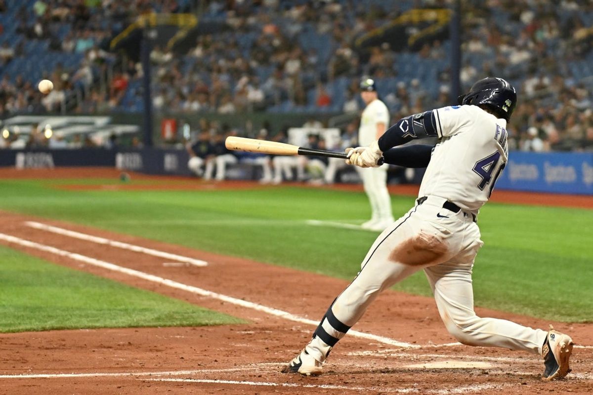 Jul 24, 2026; St. Petersburg, Florida, USA; Tampa Bay Rays catcher Nick Fortes (40) hits a RBI single in the fourth inning against the Cleveland Guardians at Tropicana Field. Mandatory Credit: Jonathan Dyer-Imagn Images