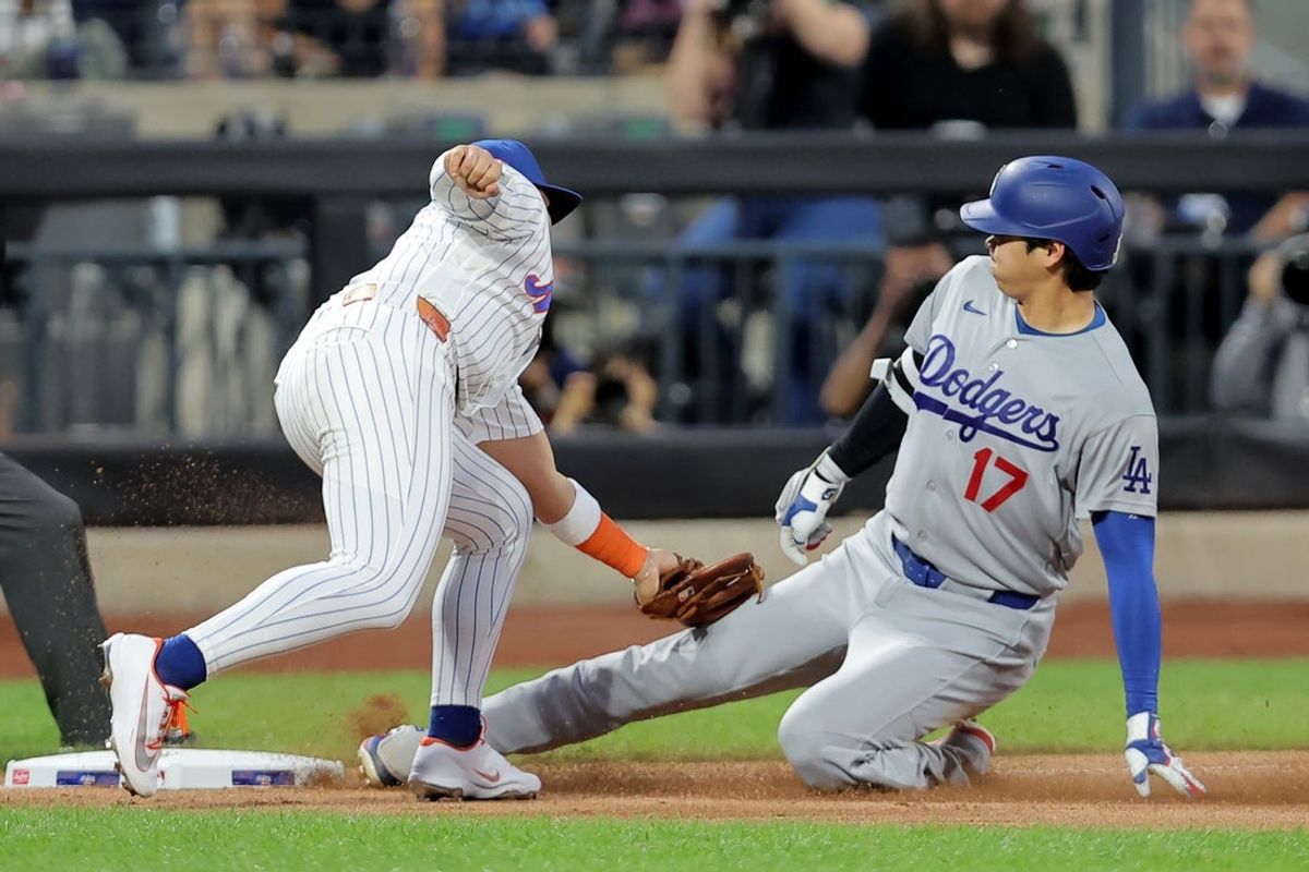 Jul 24, 2026; New York City, New York, USA; Los Angeles Dodgers designated hitter Shohei Ohtani (17) is tagged out at third base by New York Mets third baseman Bo Bichette (19) attempting to stretch a double into a triple during the fifth inning at Citi Field. Mandatory Credit: Brad Penner-Imagn Images
