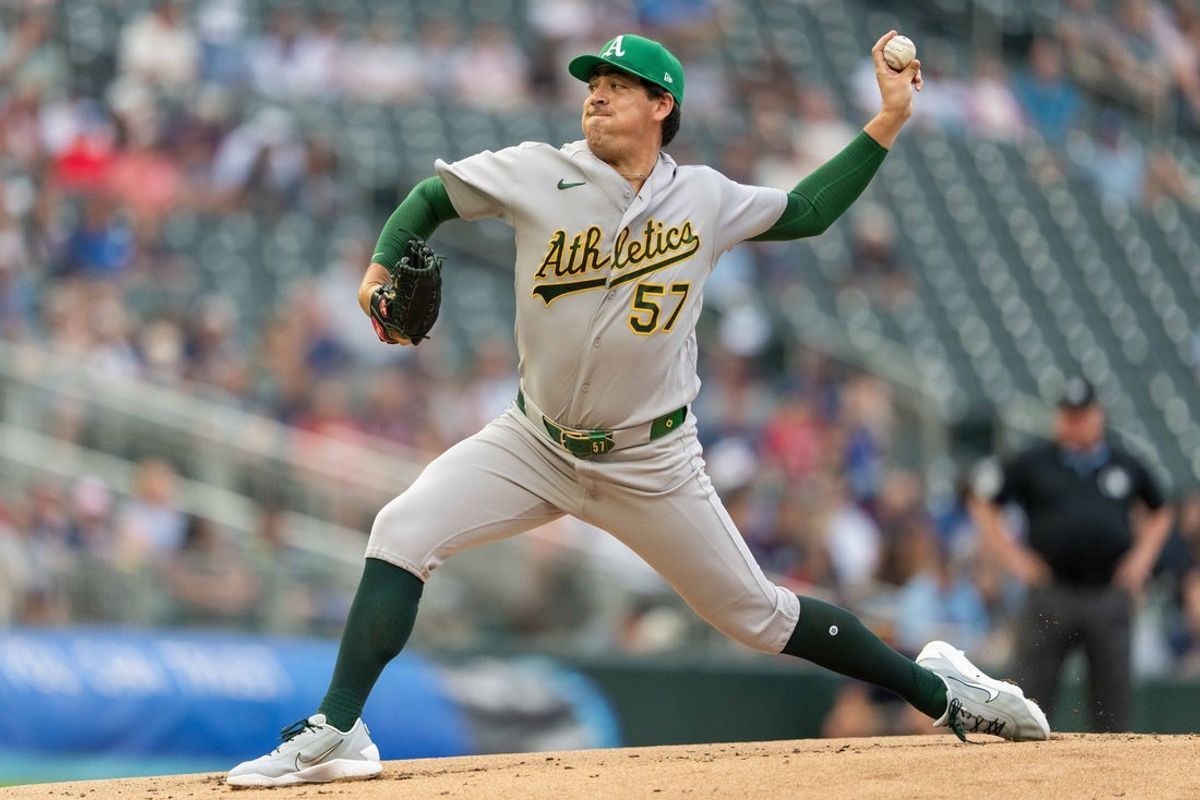 Jul 24, 2026; Minneapolis, Minnesota, USA; Athletics pitcher Jacob Lopez (57) throws a pitch during the first inning against the Minnesota Twins at Target Field. Mandatory Credit: Jordan Johnson-Imagn Images