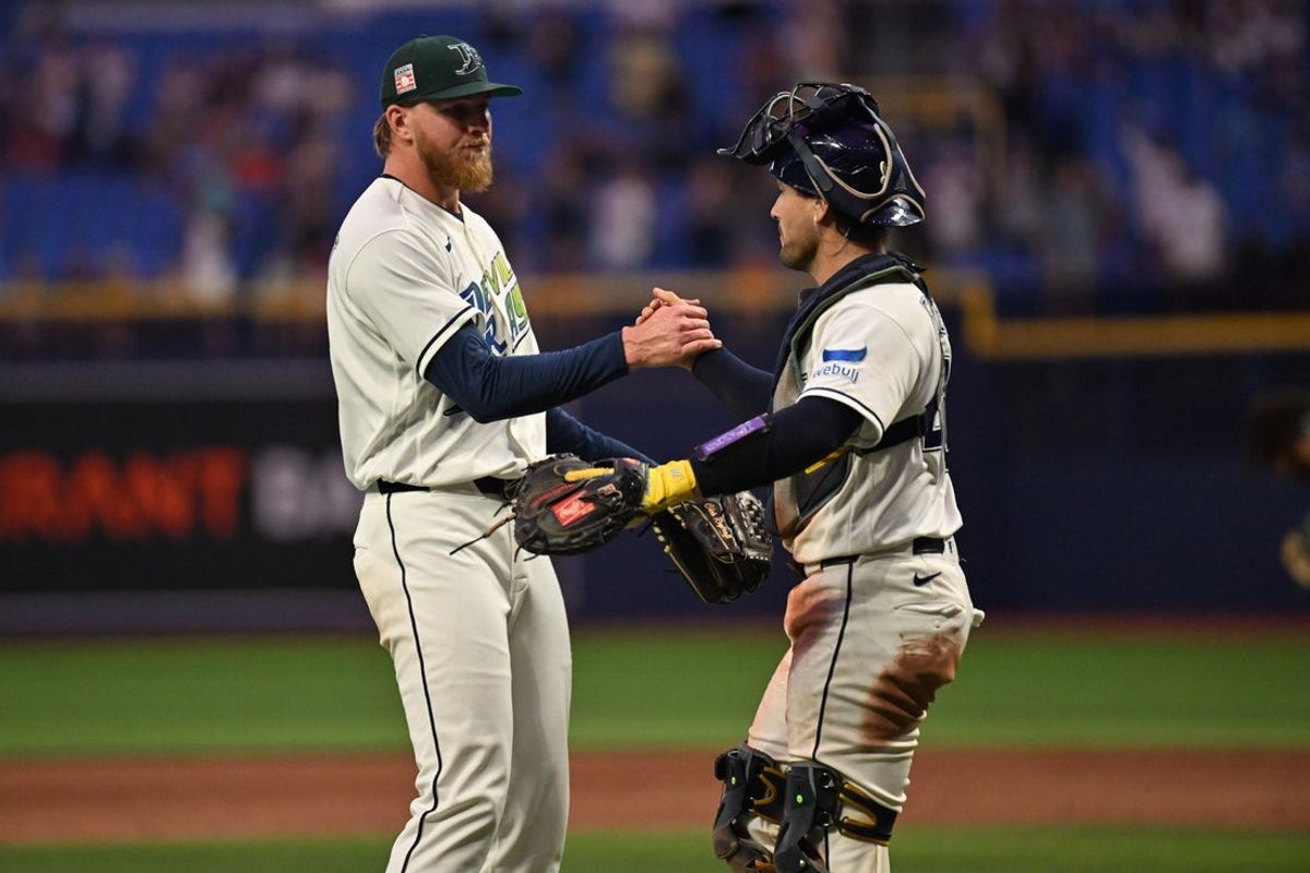Jul 24, 2026; St. Petersburg, Florida, USA; Tampa Bay Rays relief pitcher Chris Roycroft (56) and catcher Nick Fortes (40) celebrate after defeating the Cleveland Guardians  at Tropicana Field. Mandatory Credit: Jonathan Dyer-Imagn Images