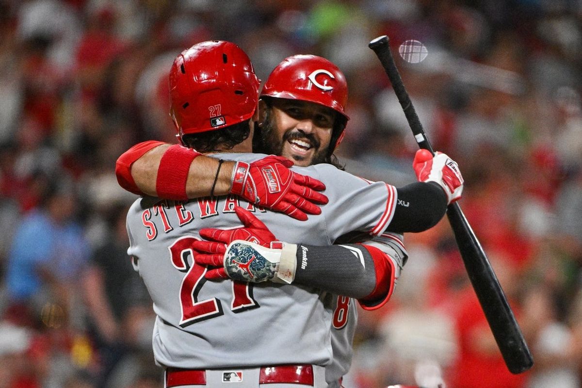 Jul 24, 2026; St. Louis, Missouri, USA; Cincinnati Reds third baseman Eugenio Suarez (28) celebrates with first baseman Sal Stewart (27) after hitting a two run home run against the St. Louis Cardinals during the seventh inning at Busch Stadium. Mandatory Credit: Jeff Curry-Imagn Images