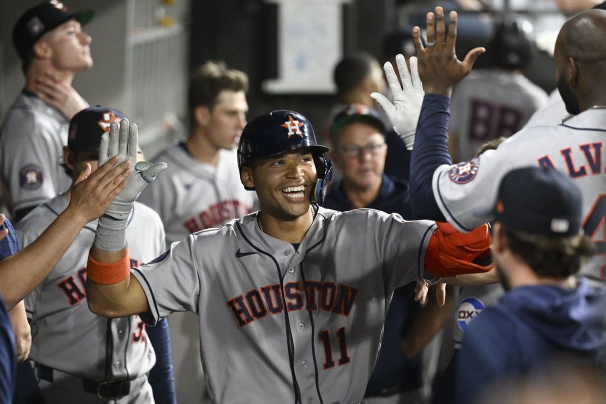 Jul 24, 2026; Chicago, Illinois, USA;  Houston Astros right fielder Cam Smith (11) celebrates in the dugout after scoring a two run home run during the sixth inning against the Chicago White Sox at Rate Field. Mandatory Credit: Matt Marton-Imagn Images