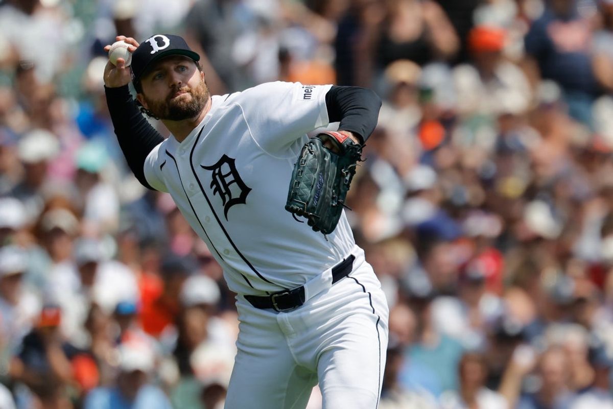 Jul 25, 2026; Detroit, Michigan, USA;  Detroit Tigers pitcher Casey Mize (12) makes a throw to first in the second inning against the Kansas City Royals at Comerica Park. Mandatory Credit: Rick Osentoski-Imagn Images