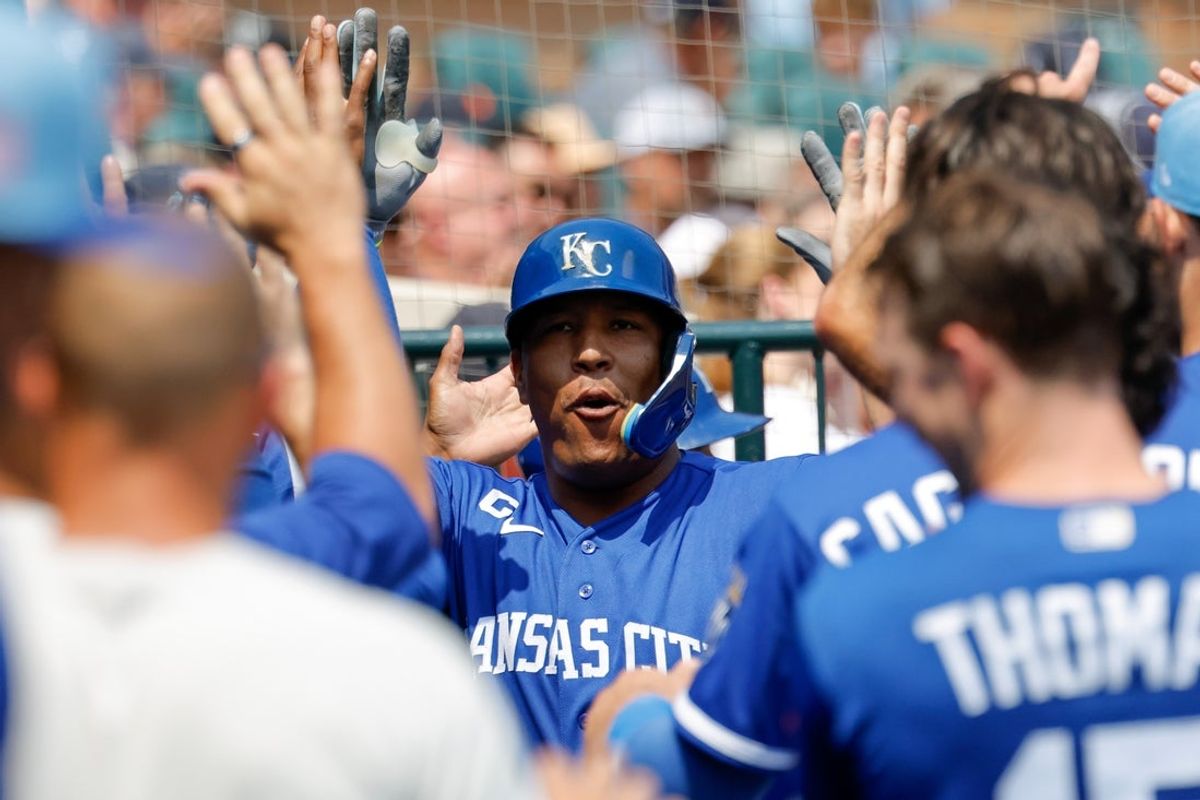 Jul 25, 2026; Detroit, Michigan, USA;  Kansas City Royals catcher Salvador Perez (13) receives receives congratulations from teammates after he hits a home run in the seventh inning against the Detroit Tigers at Comerica Park. Mandatory Credit: Rick Osentoski-Imagn Images