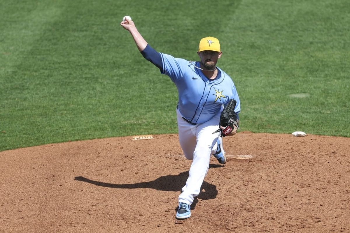Mar 7, 2024; Port Charlotte, Florida, USA;  Tampa Bay Rays relief pitcher Shawn Armstrong (64) throws a pitch against the Philadelphia Phillies in the third inning at Charlotte Sports Park.