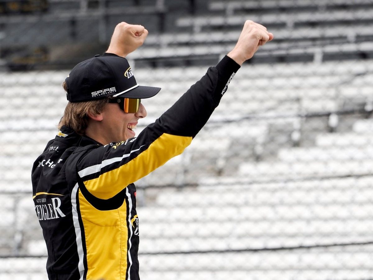 NASCAR Cup Series driver Carson Hocevar (77) reacts after winning the pole position Saturday, July 25, 2026, during qualifying for the Brickyard 400 at Indianapolis Motor Speedway.