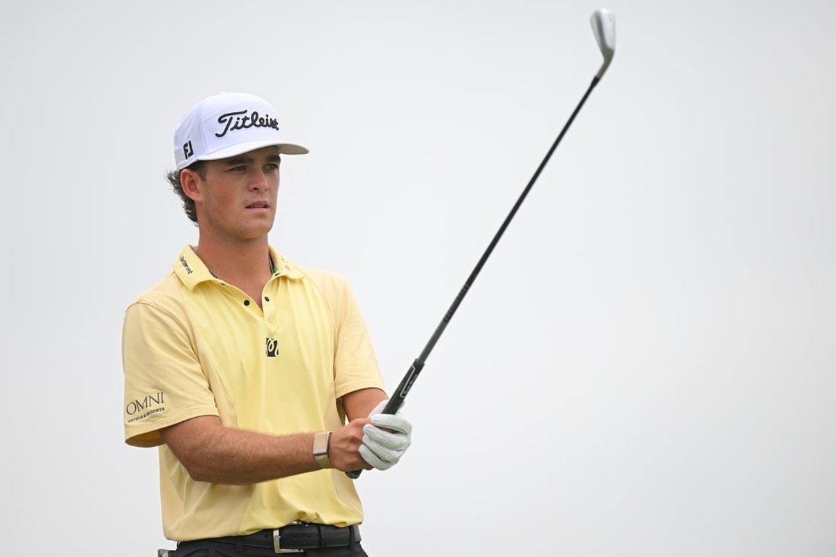 Jul 25, 2026; Blaine, Minnesota, USA;  Jackson Koivun lines up a tee shot on hole 7 during the third round of the 3M Open golf tournament at TPC Twin Cities. Mandatory Credit: Nick Wosika-Imagn Images
