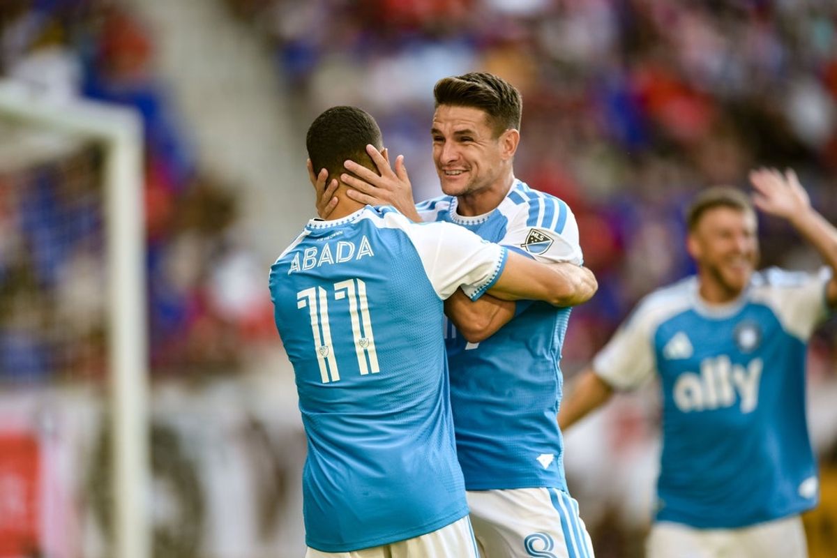 Jul 25, 2026; Harrison, New Jersey, USA; Charlotte FC offense Liel Abada (11) and midfield Ashley Westwood (8) celebrate after a goal by midfield Pep Biel (16) during the first half against Red Bull New York at Sports Illustrated Stadium. Mandatory Credit: John Jones-Imagn Images