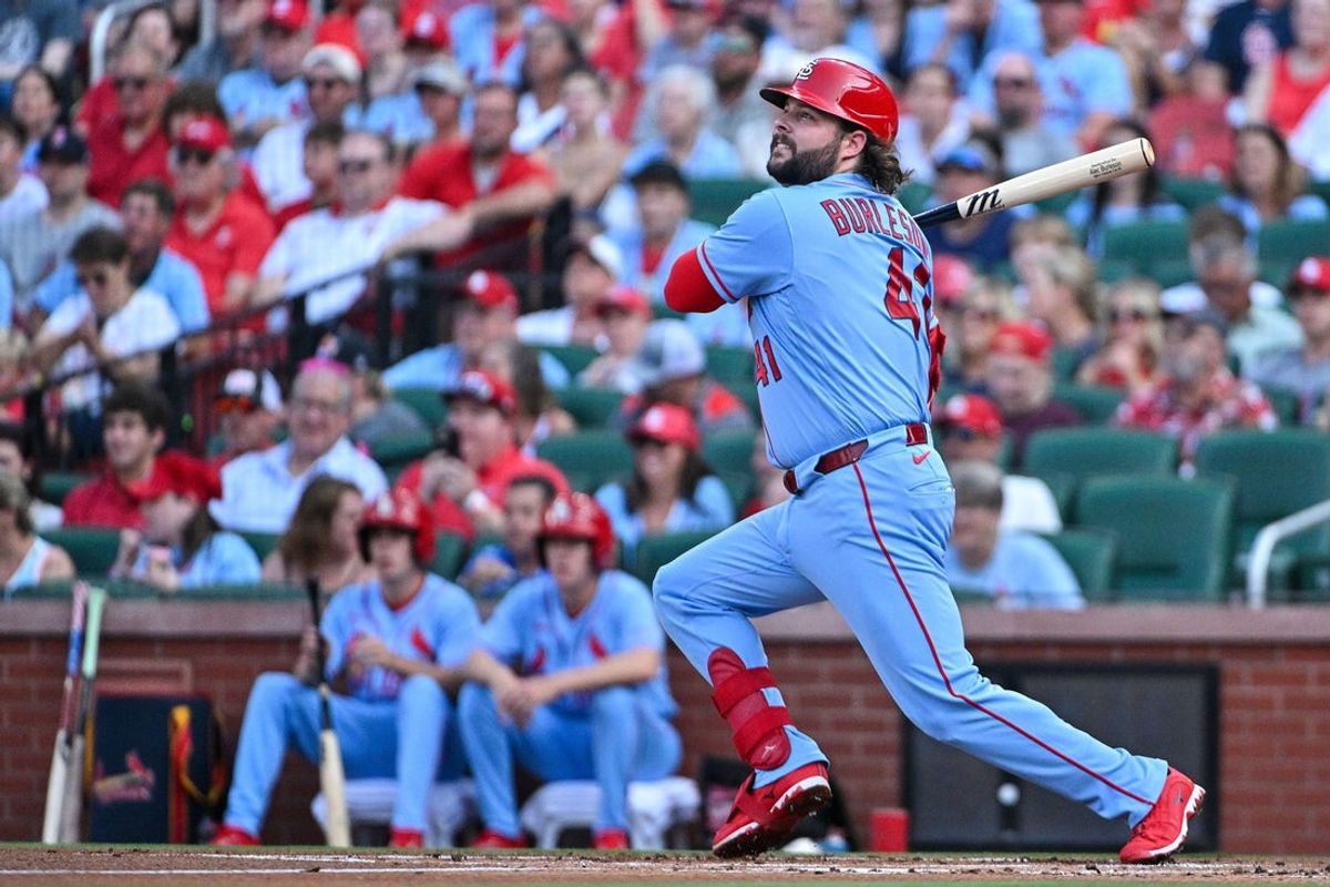 Jul 25, 2026; St. Louis, Missouri, USA; St. Louis Cardinals first baseman Alec Burleson (41) hits a one run single against the Cincinnati Reds during the first inning at Busch Stadium. Mandatory Credit: Jeff Curry-Imagn Images