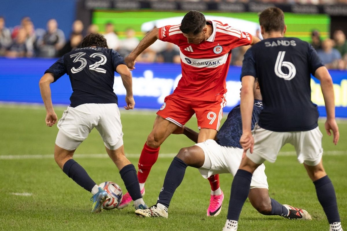 Jul 25, 2026; New York, New York, USA; Chicago Fire FC offense Robert Lewandowski (9) goes for the ball against the New York City Football Club during the second half at Yankee Stadium. Mandatory Credit: Thomas Salus-Imagn Images