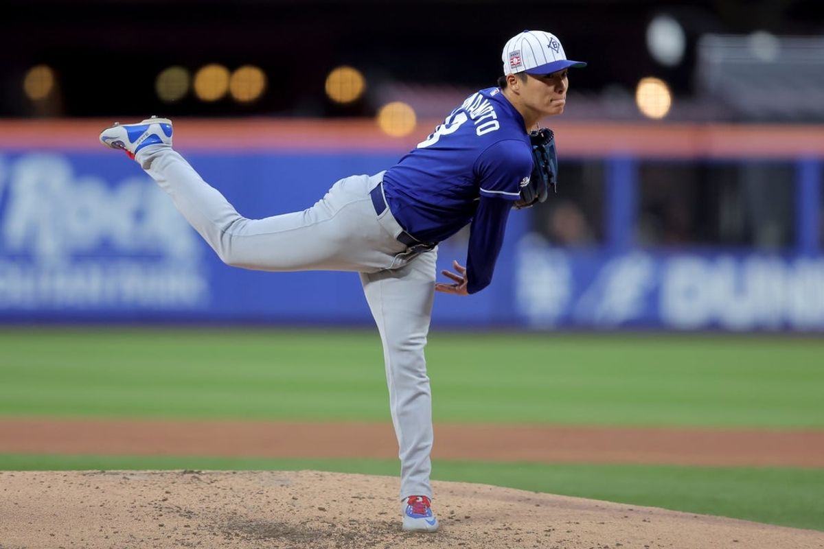 Jul 25, 2026; New York City, New York, USA; Los Angeles Dodgers starting pitcher Yoshinobu Yamamoto (18) follows through on a pitch against the New York Mets during the third inning at Citi Field. Mandatory Credit: Brad Penner-Imagn Images