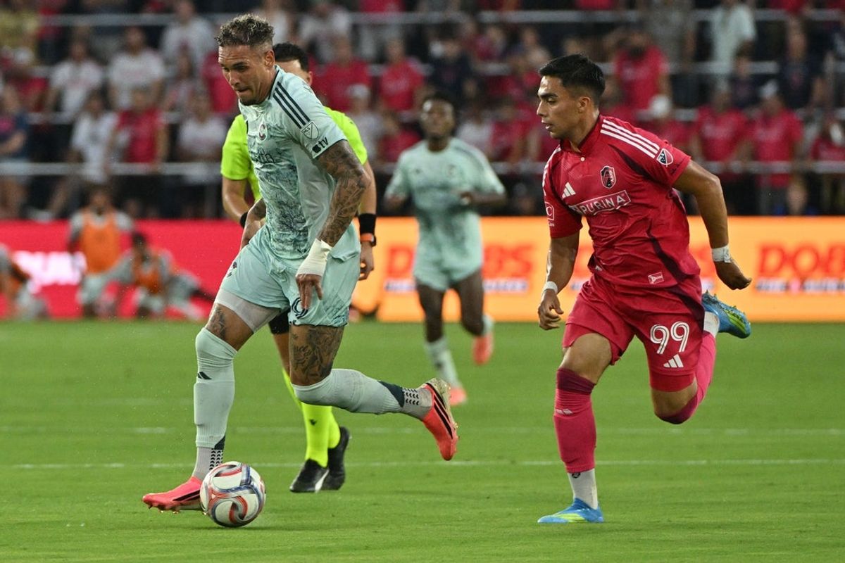 Jul 25, 2026; St. Louis, Missouri, USA; St. Louis CITY SC defense Jaziel Orozco (99) pressures Colorado Rapids offense Rafael Navarro (9) during the first half at Energizer Park. Mandatory Credit: Jeff Le-Imagn Images