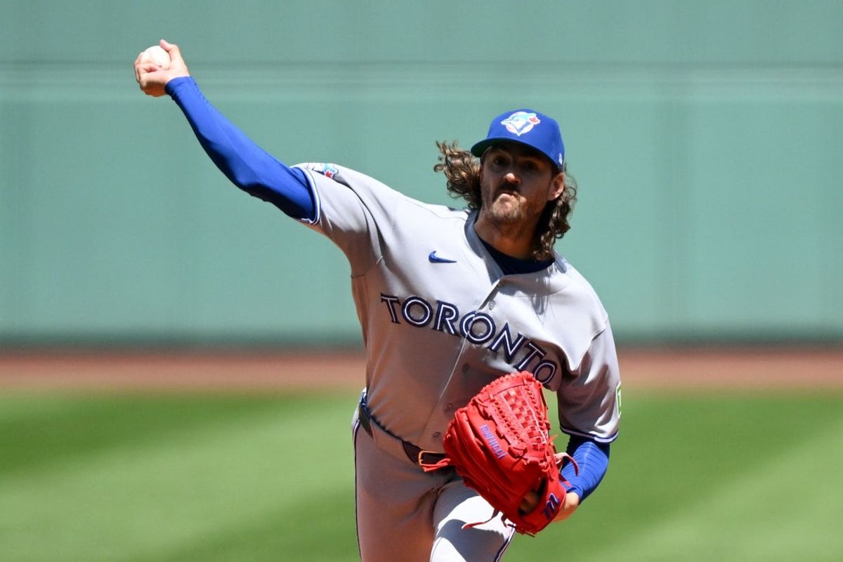 Jul 26, 2026; Boston, Massachusetts, USA; Toronto Blue Jays pitcher Kevin Gausman (34) pitches against the Boston Red Sox during the first inning at Fenway Park. Mandatory Credit: Brian Fluharty-Imagn Images