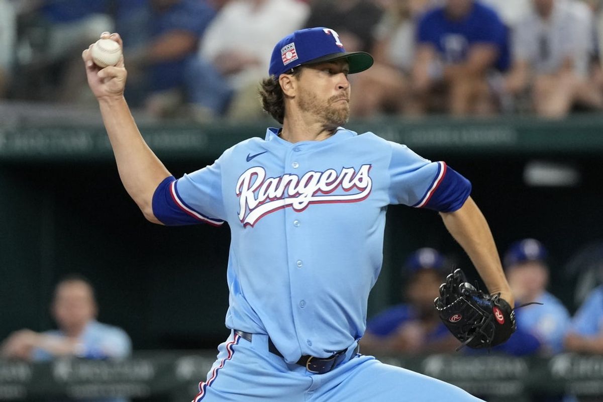 Jul 26, 2026; Arlington, Texas, USA;  Texas Rangers pitcher Jacob deGrom (48) throws to the plate against the Seattle Mariners during the first inning at Globe Life Field. Mandatory Credit: Jim Cowsert-Imagn Images