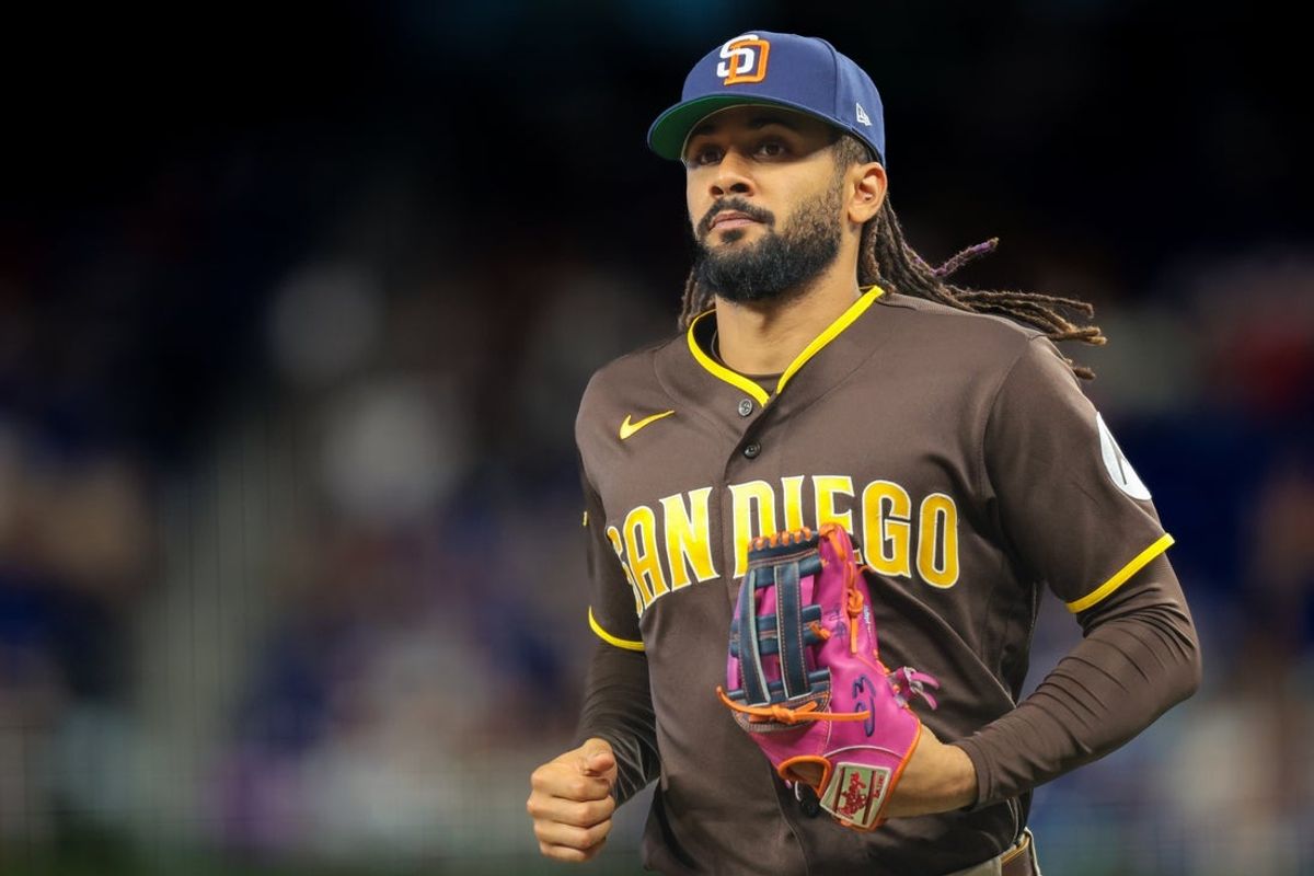 Jul 26, 2026; Miami, Florida, USA; San Diego Padres right fielder Fernando Tatis Jr. (23) returns to the dugout against the Miami Marlins during the sixth inning at loanDepot Park. Mandatory Credit: Sam Navarro-Imagn Images